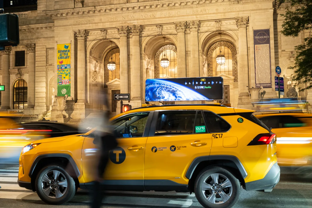 Alien: Earth (FX on Hulu) running on a digital top at New York Public Library, Fifth Avenue, New York, 2025