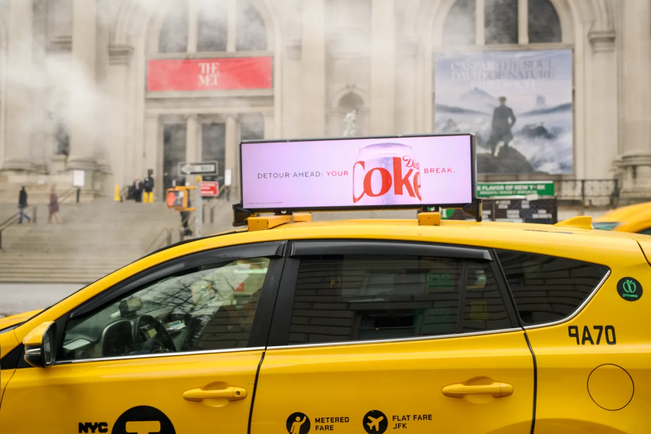 Diet Coke running on a digital top at The Metropolitan Museum, Fifth Avenue, New York, 2025