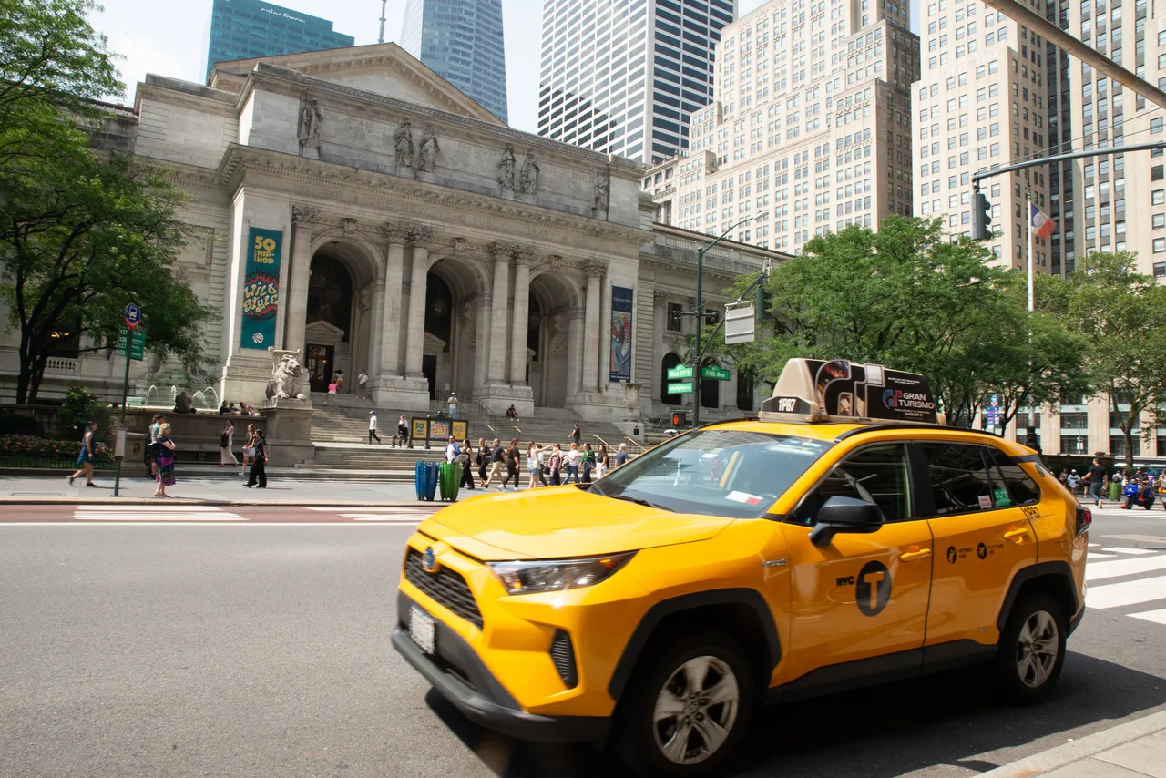 Gran Turismo running on a static top at New York Public Library, Fifth Avenue, New York, 2023