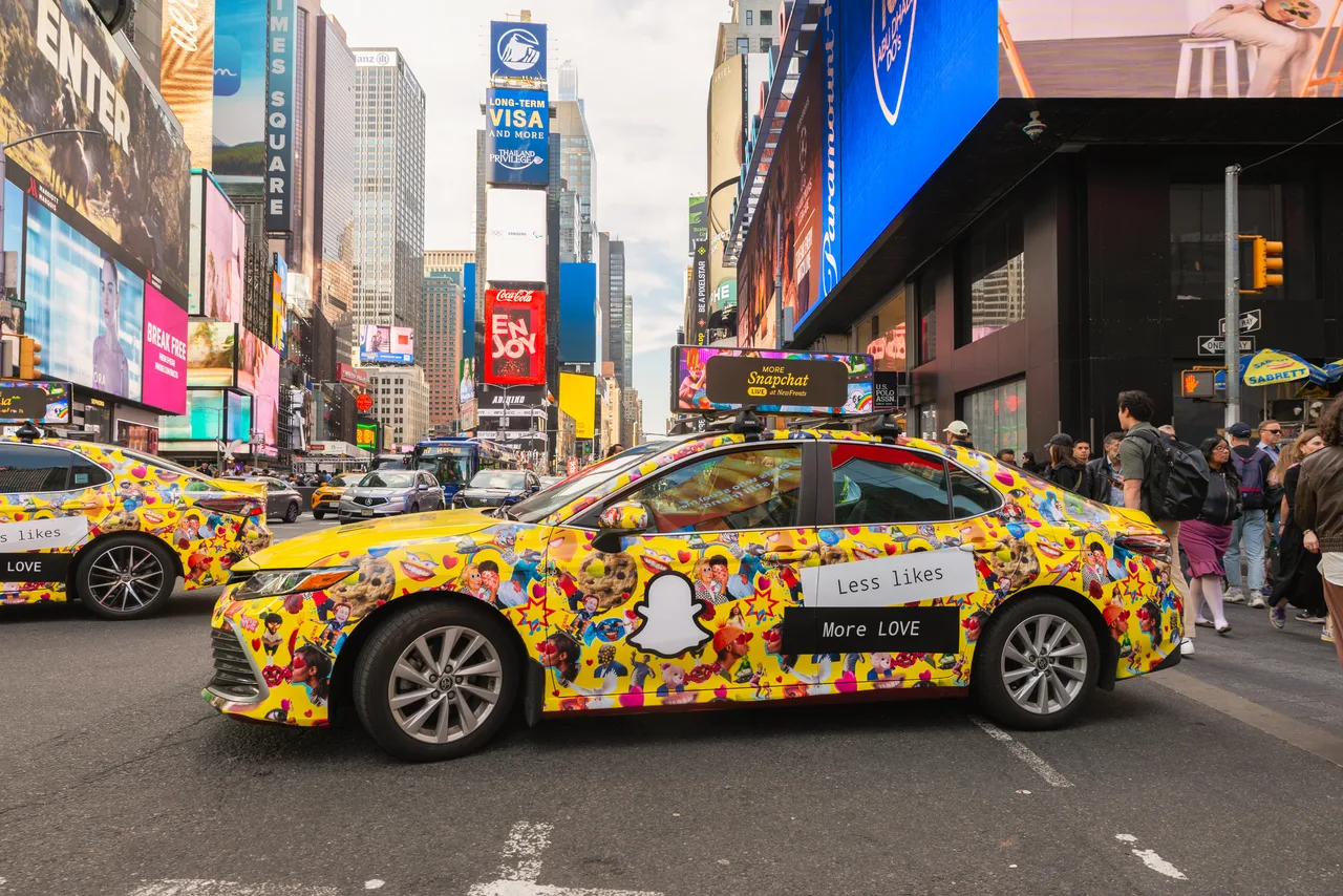 Snapchat running on a 360 wrap with digital top at Times Square, New York, 2024