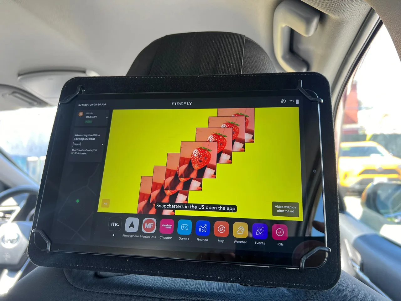Snapchat running on a in-car screen at Inside a New York cab, New York