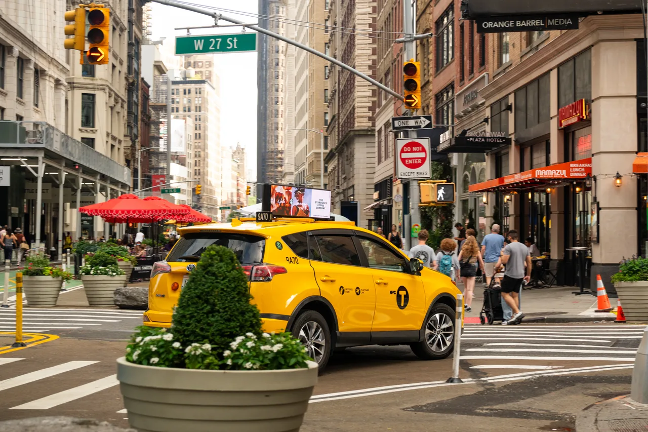Starbucks running on a digital top at West 27th Street, NoMad, New York, 2024