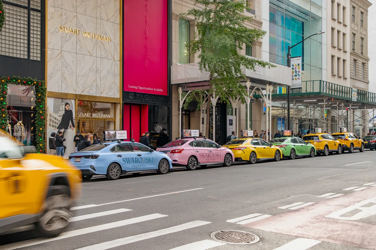 Swarovski running on a full wrap swarm at Fifth Avenue, New York, 2024
